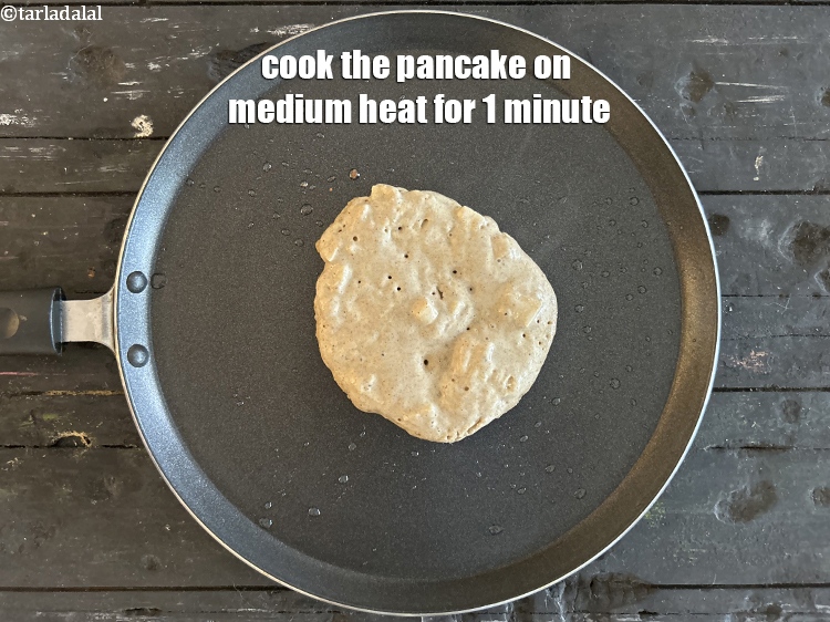 Step 21 – Cook the pancake on a medium flame for 1 minute.