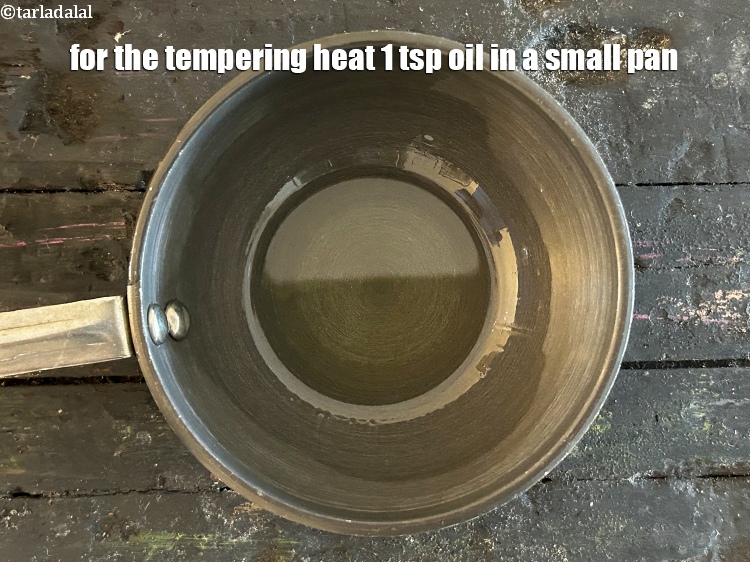 Step 23 – For the tempering heat&nbsp;<meta charset="UTF-8" />1 tsp&nbsp;<a href="glossary-oil-671i">oil</a>&nbsp;in a small pan.