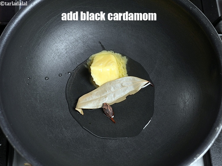 Step 21 – Add 1 <a href="https://www.tarladalal.com/glossary-black-cardamom-badi-elaichi-moti-elaichi-263i">black cardamom (badi elaichi)</a>.