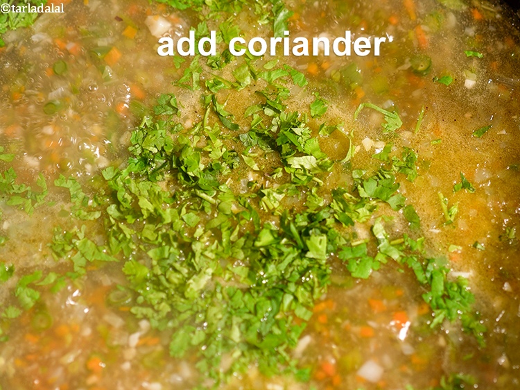 Step 24 – Add 1 tbsp finely <a href="https://www.tarladalal.com/glossary-chopped-coriander-783i">chopped coriander (dhania)</a>.