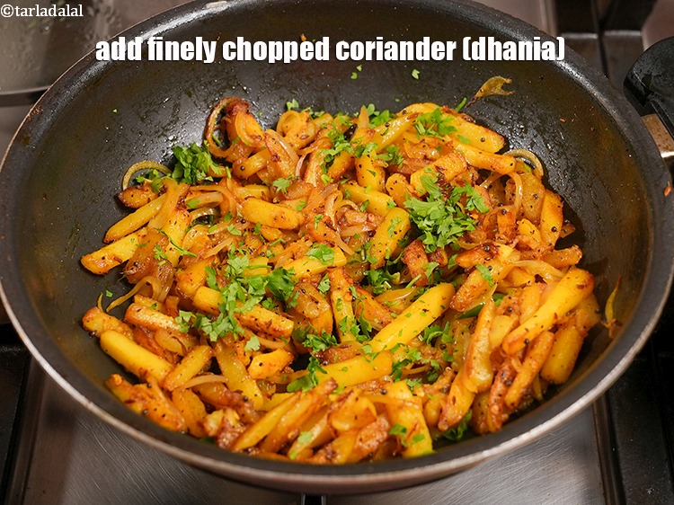 Step 21 – Add&nbsp;1 tbsp&nbsp;finely&nbsp;<a href="https://www.tarladalal.com/glossary-chopped-coriander-783i">chopped coriander (dhania)</a>.