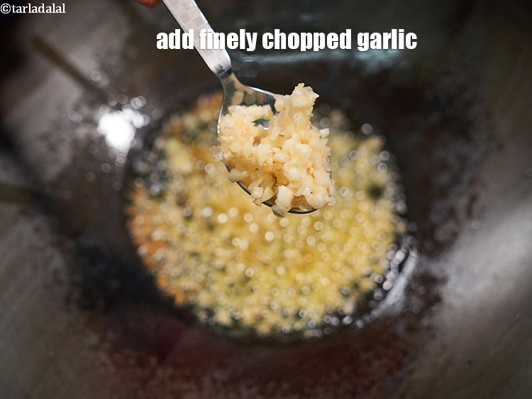 Step 22 – <p>Add 1 tbsp finely chopped garlic.</p>