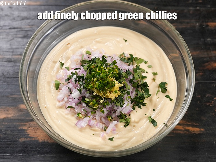 Step 21 – Add 2 tsp finely <a href="https://www.tarladalal.com/glossary-chopped-green-chilli-820i">chopped green chillies</a>.&nbsp;