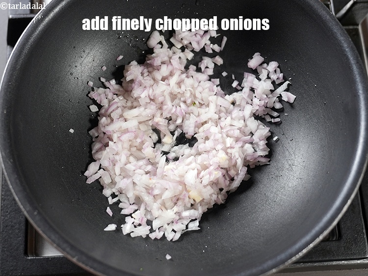 Step 21 – Add &frac12; cup finely&nbsp;<a href="https://www.tarladalal.com/glossary-chopped-onions-722i">chopped onions</a>.&nbsp;