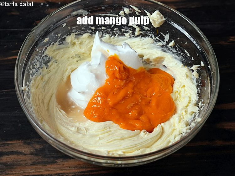 Step 22 – Add &frac12; cup&nbsp;<a href="https://www.tarladalal.com/glossary-mango-pulp-aam-ras-amras-146i">mango pulp</a>.