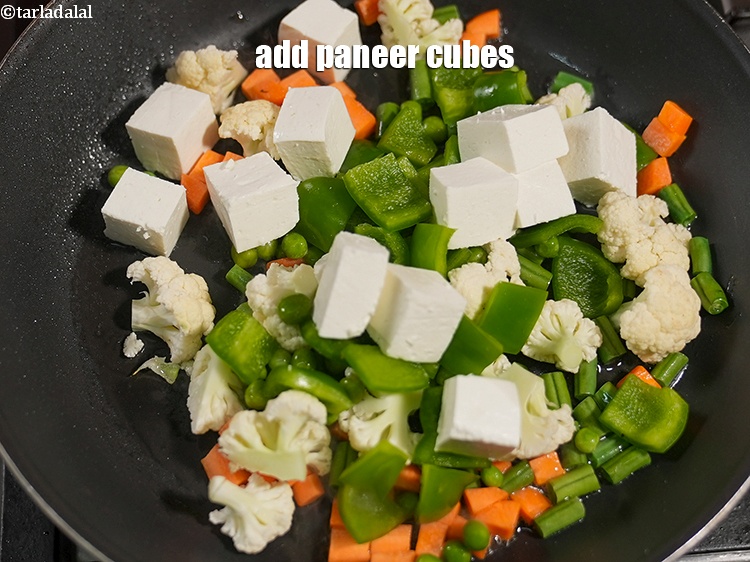 Step 21 – Add 1 cup <a href="https://www.tarladalal.com/glossary-paneer-cubes-cottage-cheese-cubes-1002i">paneer (cottage cheese) cubes</a>.&nbsp;