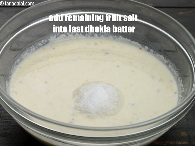 Step 22 – Now add remaining &frac12; tsp fruit salt into the last dhokla batter.