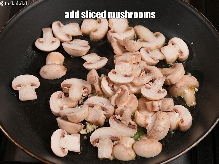 Step 21 – Add 2&frac12; cups&nbsp;<a href="https://www.tarladalal.com/glossary-sliced-mushrooms-747i">sliced mushrooms (khumbh)</a>.&nbsp;