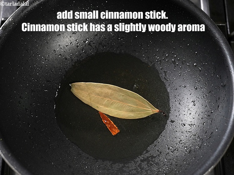 Step 21 – Add 1 small <a href="https://www.tarladalal.com/glossary-cinnamon-dalchini-346i">cinnamon</a>&nbsp;stick. Cinnamon stick has a slightly woody aroma.