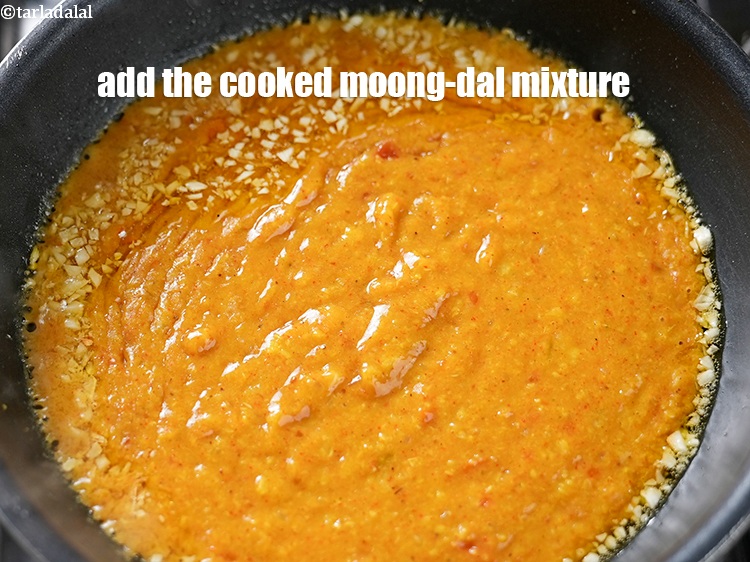 Step 21 – Add the cooked moong-dal mixture.