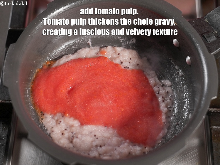 Step 21 – Add &frac12; cup <a href="https://www.tarladalal.com/glossary-tomato-pulp-tamatar-ka-pulp-1039i">tomato pulp</a>. Tomato pulp thickens the chole gravy, creating a luscious …