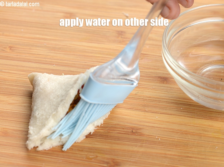 Step 21 – Apply little water on other side.