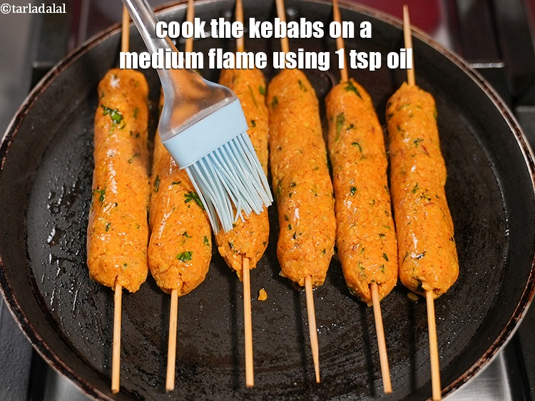 Step 24 – Cook the kebabs on a medium flame using 1 tsp oil till they are evenly …