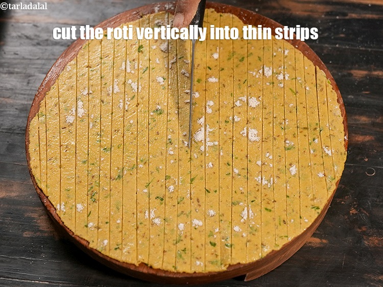 Step 21 – Cut the roti vertically into thin strips.