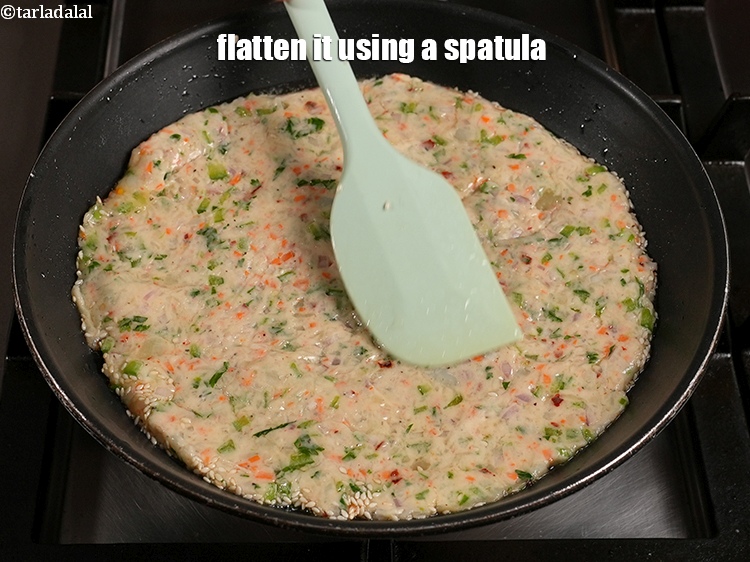 Step 21 – Flatten it using a spatula.