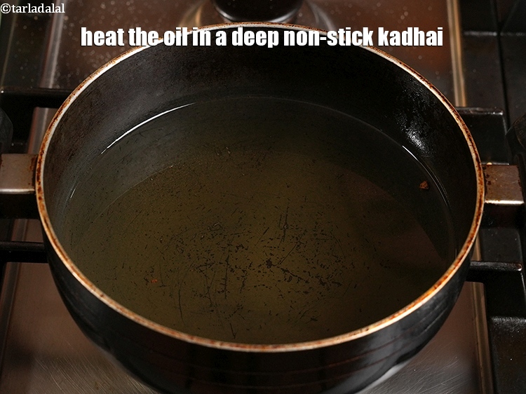 Step 21 – Heat the oil in a deep non-stick kadhai.