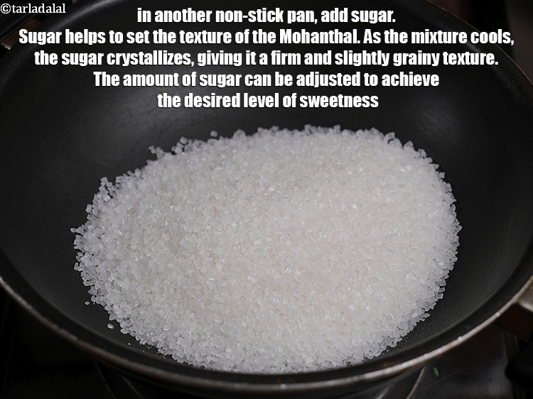 स्टेप 21 – दूसरे नॉन-स्टिक पैन में&nbsp;२ कप&nbsp;<a href=""https://www.tarladalal.com/glossary-sugar-chini-shakkar-hindi-278i"">चीनी</a>&nbsp;डालें । चीनी मोहनथाल की …