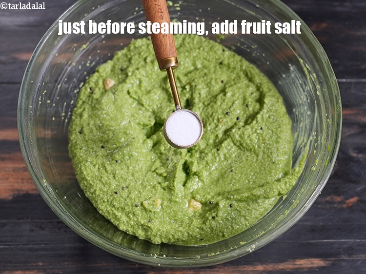 Step 21 – Just before steaming, add 1 tsp <a href="https://www.tarladalal.com/glossary-fruit-salt-420i">fruit salt</a>.