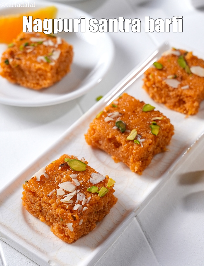 Step 21 – Serve <strong>orange barfi </strong>immediately or store in refrigerator for 2 days and use as require.&nbsp;
