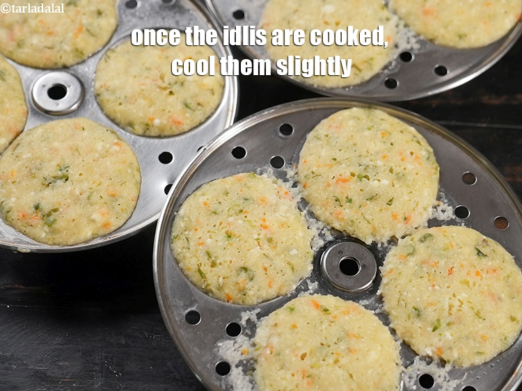 Step 21 – Once the idlis are cooked, cool them slightly.
