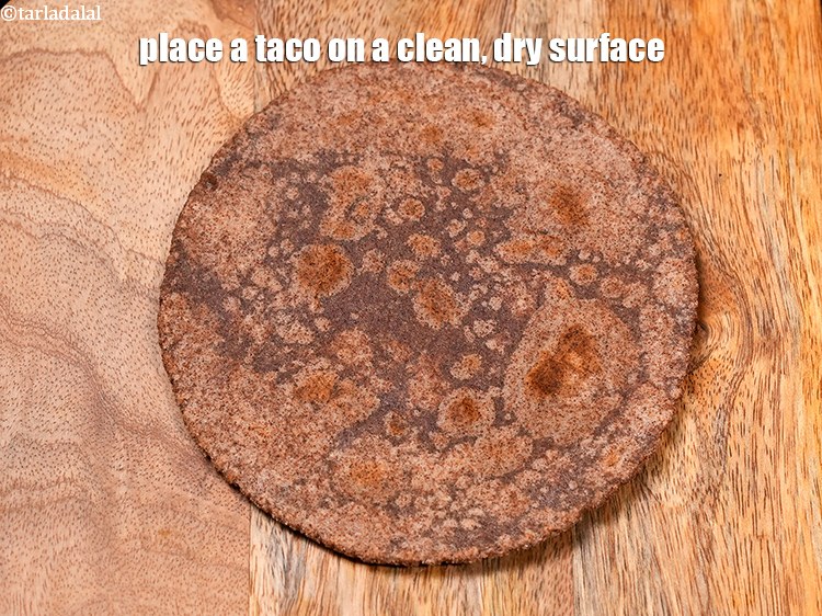 Step 22 – Place a taco on a clean, dry surface.