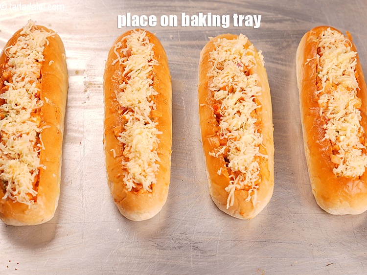 Step 22 – Place them on a greased baking tray.