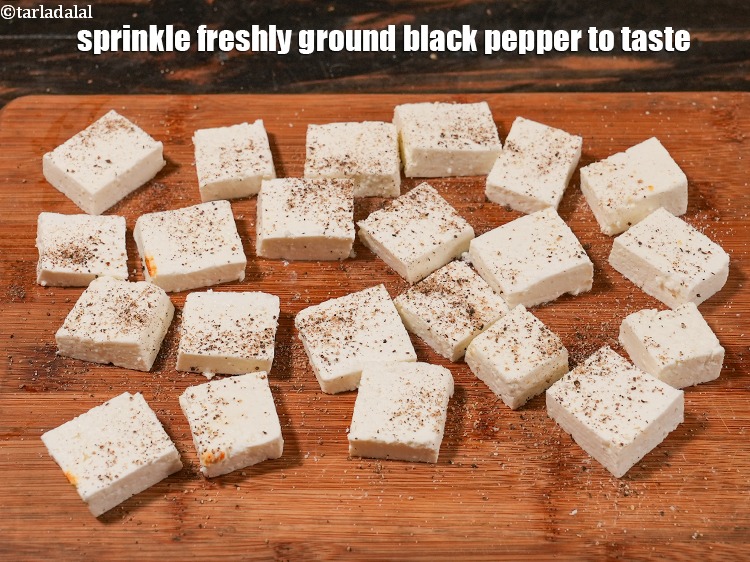 Step 21 – Sprinkle f<a href="https://www.tarladalal.com/glossary-freshly-ground-black-pepper-kalimirch-powder-kali-mirch-ka-powder-567i">reshly ground black pepper (kalimirch)</a> to taste.