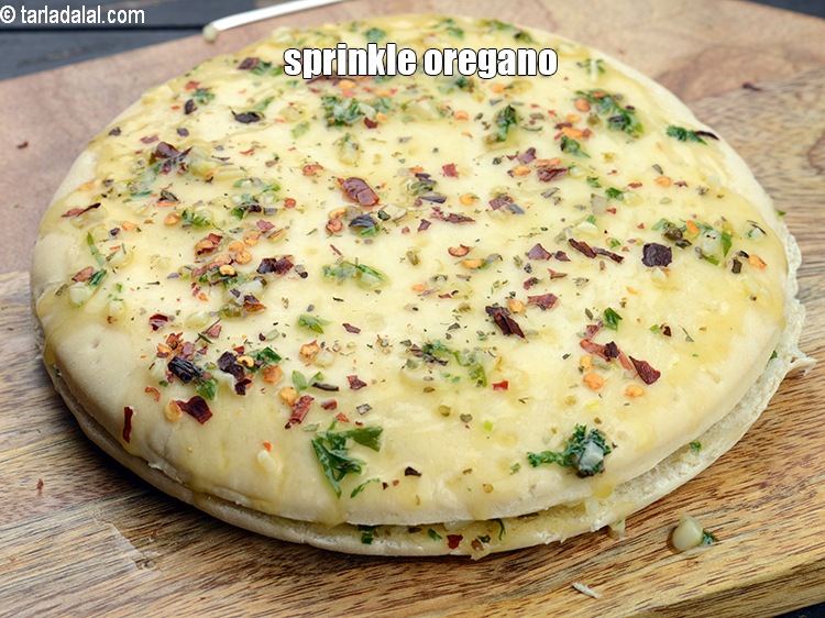 Step 21 – Sprinkle oregano.