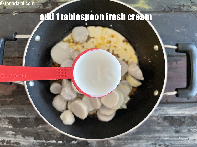 Step 32 – Add&nbsp;<meta charset="UTF-8" />1 tbsp&nbsp;<a href="glossary-fresh-cream-1877i">fresh cream</a>.