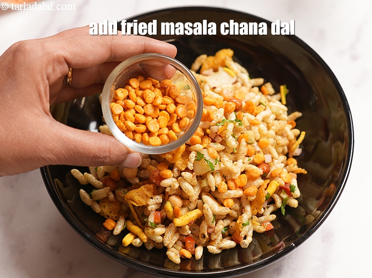 Step 22 – Add <a href="https://www.tarladalal.com/glossary-fried-masala-chana-dal-1913i">fried masala chana dal</a>.