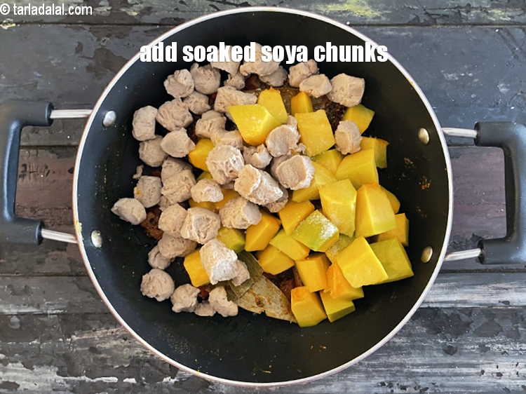 Step 26 – Add&nbsp;<meta charset="UTF-8" />1/2 cup&nbsp;<a href="glossary-soaked-and-chopped-soy-chunks-1631i">soaked and chopped soya chunks</a>. 1/2 cup becomes 1 cup on …
