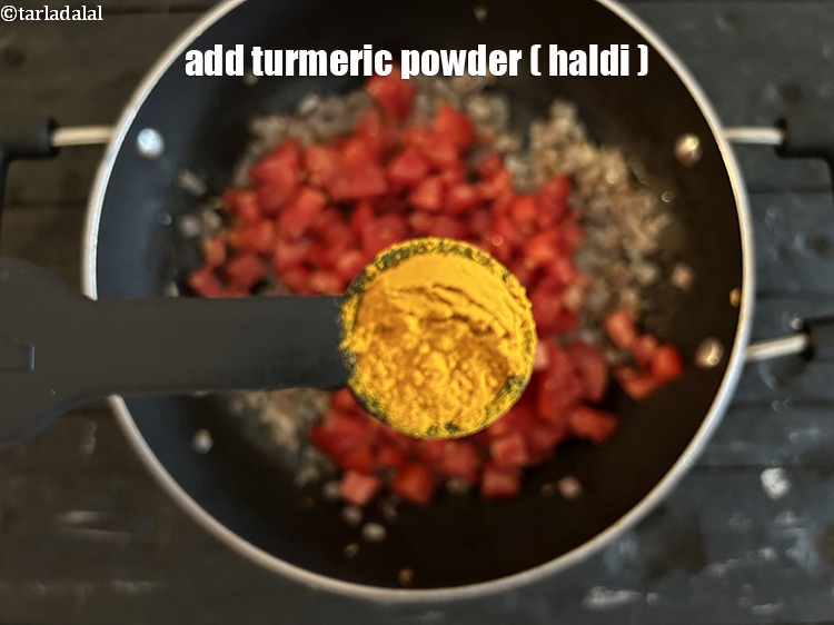 Step 27 – Add&nbsp;<meta charset="UTF-8" />1/2 tsp&nbsp;<a href="glossary-turmeric-powder-haldi-645i">turmeric powder (haldi)</a>.