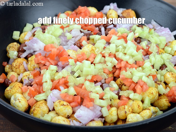 Step 22 – Add 5 tbsp finely <a href="https://www.tarladalal.com/glossary-chopped-cucumber-795i">chopped cucumber</a>.