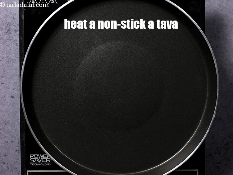 Step 28 – Heat a non-stick a tava (griddle).&nbsp;