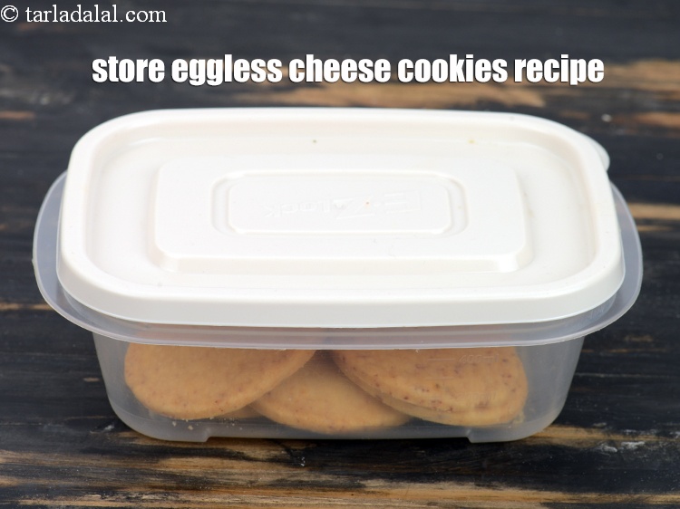 Step 21 – Store <strong>eggless cheese cookies recipe | homemade Indian cheese cookies | cheese biscuits |</strong> in …