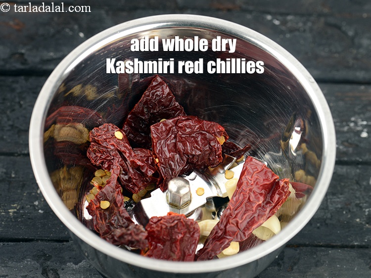 Step 22 – Add 3 <a href="https://www.tarladalal.com/glossary-whole-dry-kashmiri-red-chillies-kashmiri-mirch-kashmiri-lal-mirch-332i">whole dry kashmiri red chillies</a>.