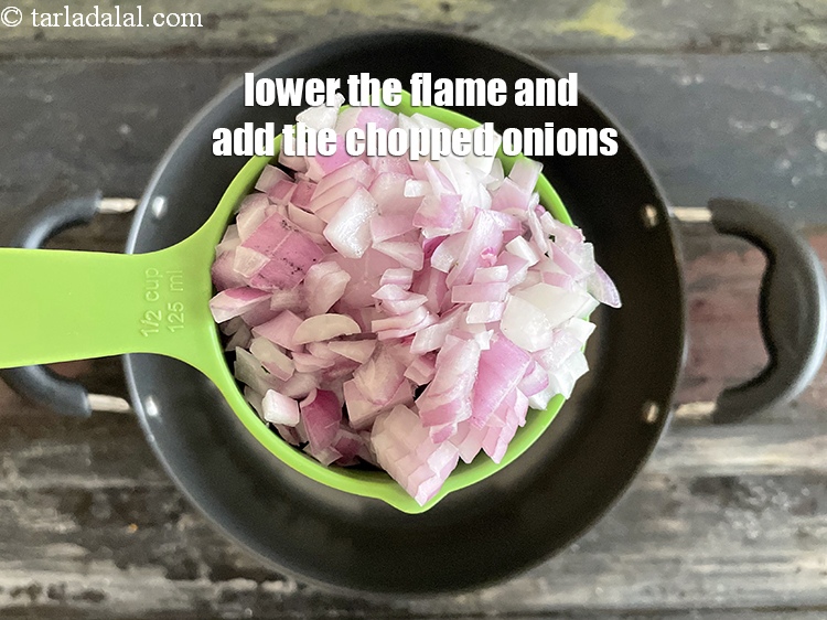 Step 21 – Lower the flame, add 1/2 cup chopped onions.