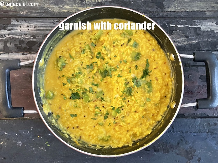 Step 30 – Garnish&nbsp;<strong>turiya mag ni dal | turai moong dal | healthy ridge gourd curry |&nbsp;</strong>with coriander.