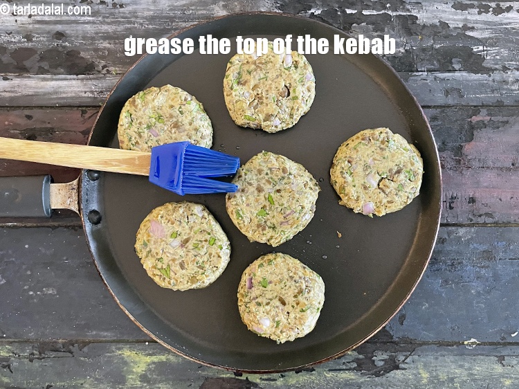 Step 34 – <meta charset="UTF-8" />Grease the top of the tikki.&nbsp;