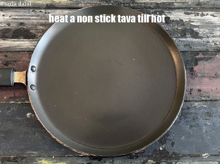 Step 21 – Heat a non-stick tava (griddle) till hot.