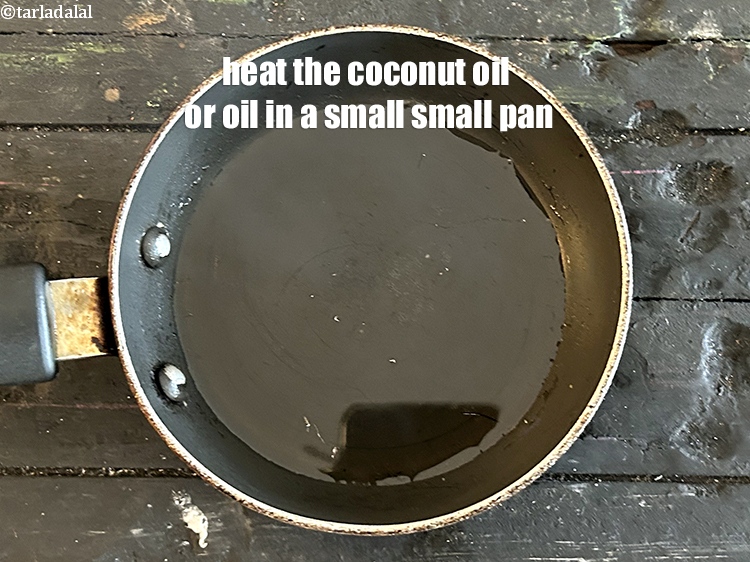 Step 23 – Heat <meta charset="UTF-8" />1 1/2 tsp&nbsp;<a href="glossary-coconut-oil-nariyal-ka-tel-1186i">coconut oil</a> in a broad non-stick pan.