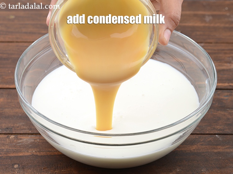 Step 21 – Add &frac12; cup <a href="https://www.tarladalal.com/glossary-condensed-milk-672i">condensed milk</a>.