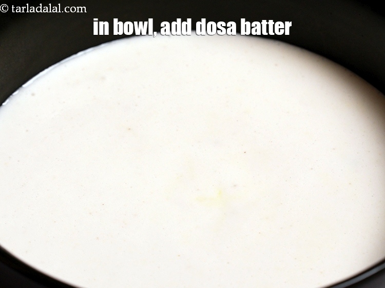 Step 22 – In a deep bowl, add the <a href="https://www.tarladalal.com/glossary-dosa-batter-1891i">dosa batter</a>.&nbsp;