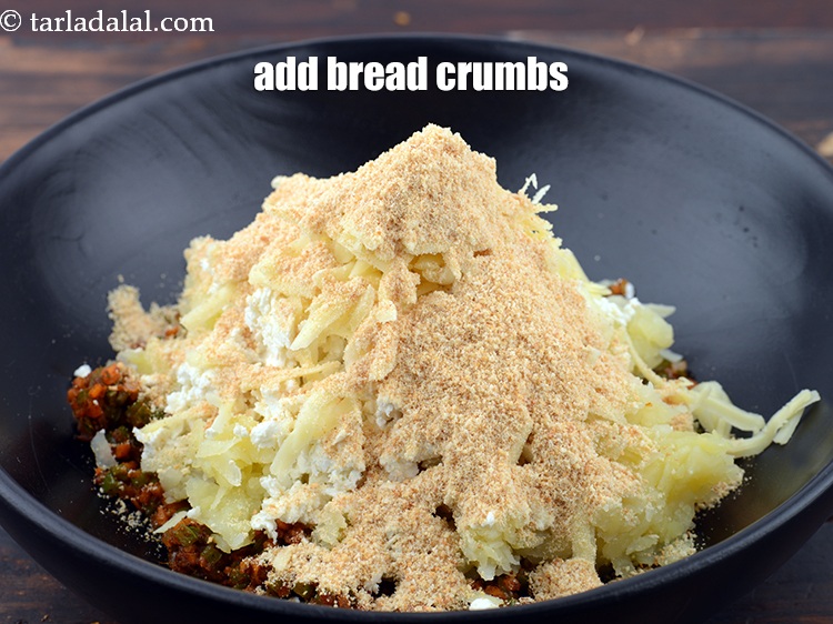Step 21 – Add 5 tbsp&nbsp;<a href="https://www.tarladalal.com/glossary-bread-crumbs-breadcrumbs-222i">bread crumbs</a>.