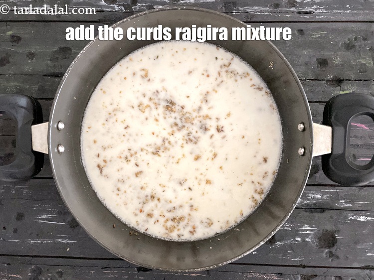 Step 24 – <p>Add the curds- rajgira flour mixture.</p>
