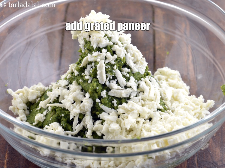 Step 20 – Add &frac12; cup&nbsp;<a href="https://www.tarladalal.com/glossary-grated-panee-1003i">grated paneer (cottage cheese)</a>.