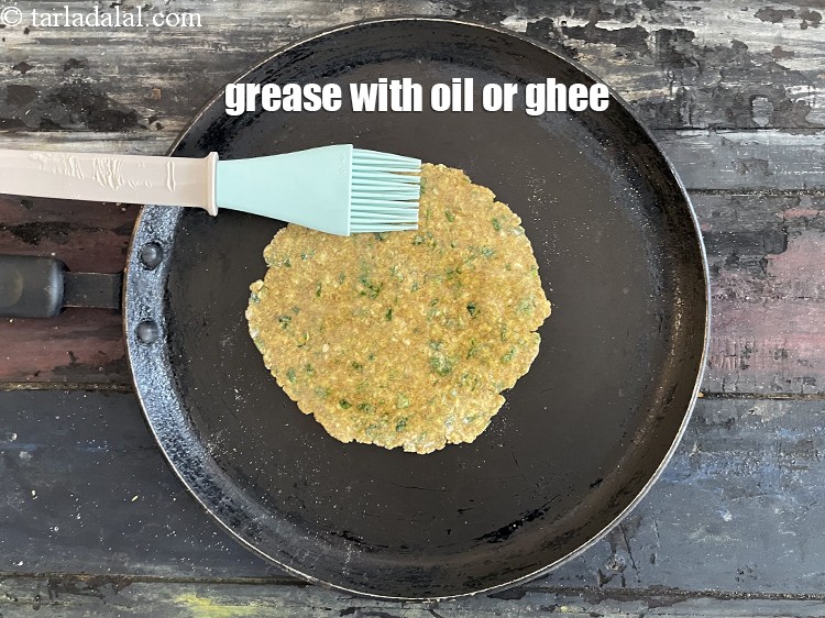 Step 23 – <meta charset="UTF-8" />Grease with &nbsp;&frac14; tsp of oil or ghee.&nbsp;