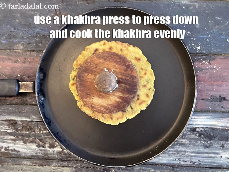 Step 21 – <meta charset="UTF-8" /> With the help of a khakhra press or &nbsp;folded muslin cloth, press …