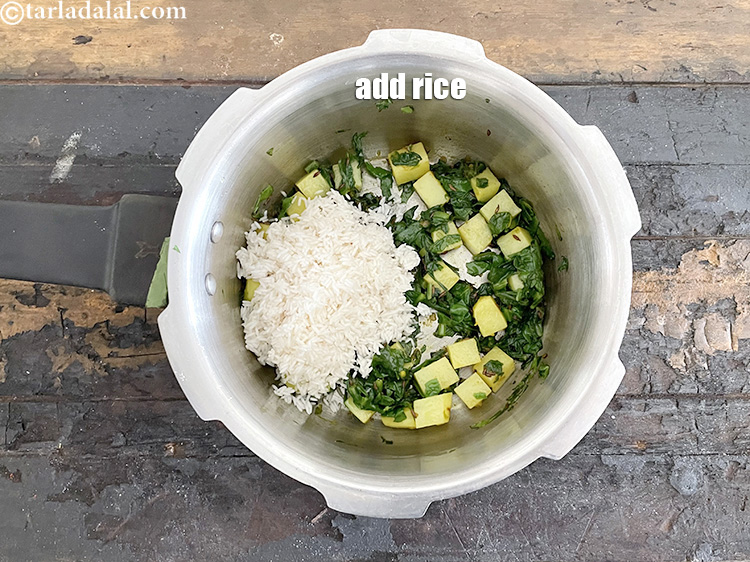 Step 29 – Add&nbsp;<meta charset="UTF-8" />1/2 cup&nbsp;<a href="glossary-rice-chawal-533i">rice (chawal)</a>&nbsp;, washed and drained.