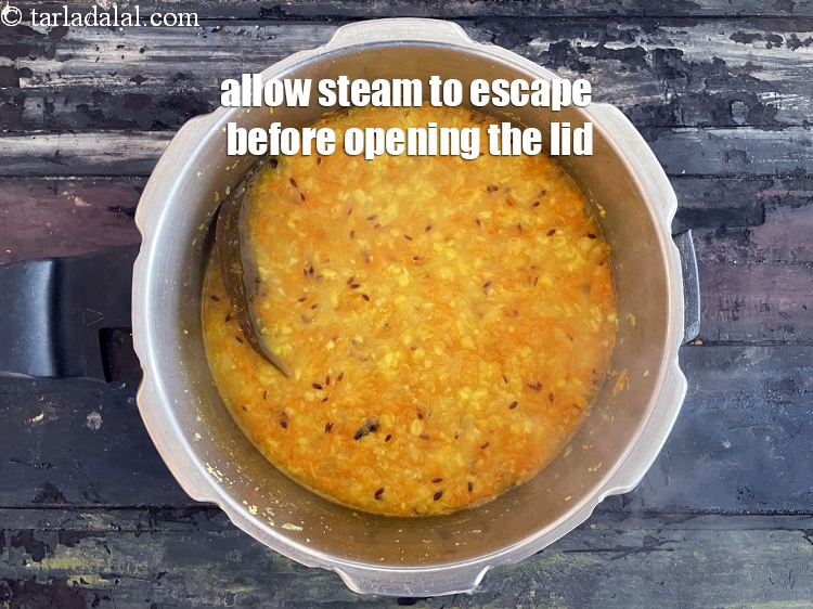 Step 30 – Allow the steam to escape before opening the lid.